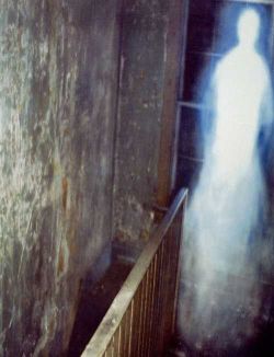 sixpenceee:  Abandoned House Ghost Photo, Missouri, USA. This was taken by Tom Halstead, in an old abandoned house. Tom reported that as he stood in a bedroom on the first floor, he looked around and saw a huge glowing entity moving up the staircase