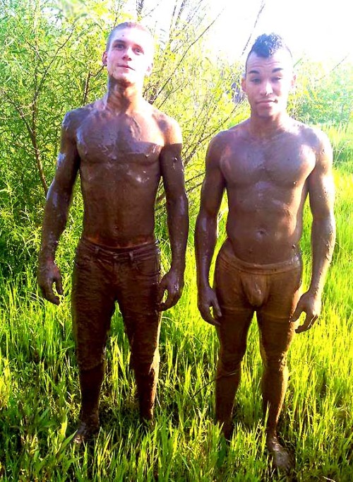 Cute bois playing in the mud