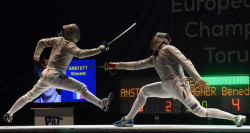 modernfencing:  [ID: two sabre fencers in