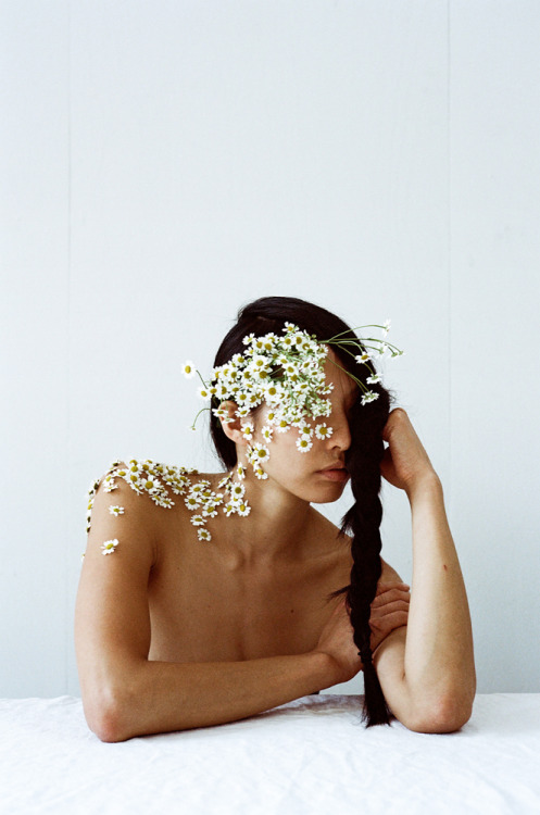 mallowtree:  digbicks:  Photographer Parker Fitzgerald (on Tumblr) and floral designer Riley Messina in the artistic collaboration: Overgrowth.  Inspired by a pursuit of beauty, Riley combines classically thoughtful botanical designs with Parker’s