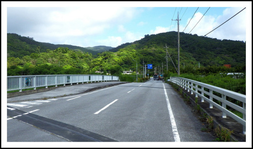 THE STAINED GLASS BRIDGE – Crossing the Okuma River on the Way to HIJI FALLS