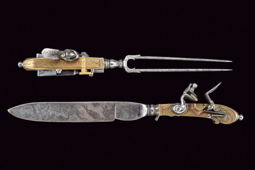 A knife and fork set of flintlock pistols originating from Germany, 18th century.