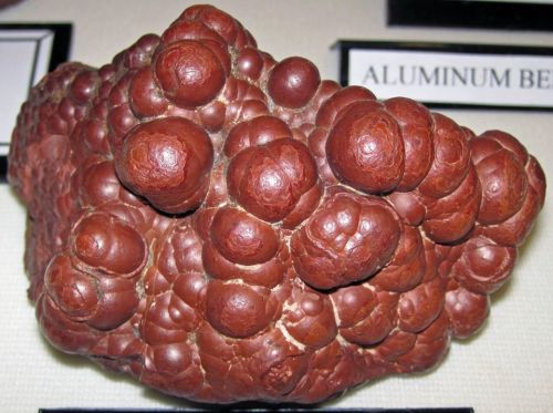 Wood TinThis bulbous rock is dominated by the mineral cassiterite, a simple tin oxide mineral that i