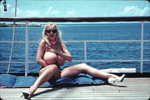 XXX big90s:Traci Topps in high heels on a boat photo