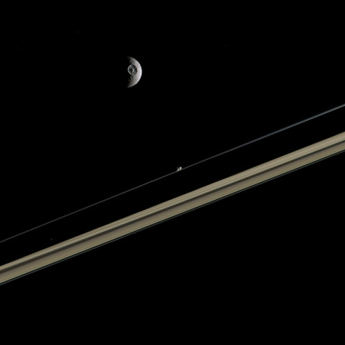 Mimas and Prometheus Image Credit: NASA / JPL / Cassini-ISS / Justin Cowart