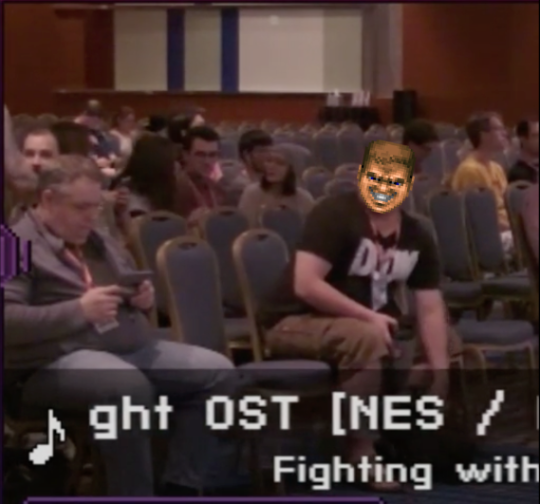 kbnet:  durbikins: Look at how excited this dude is to watch some Doom  but also DS dad is there