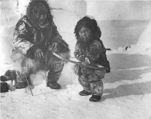 whattolearntoday:This is a picture of an Inuk man teaching a boy how to shoot. His name was Allakari