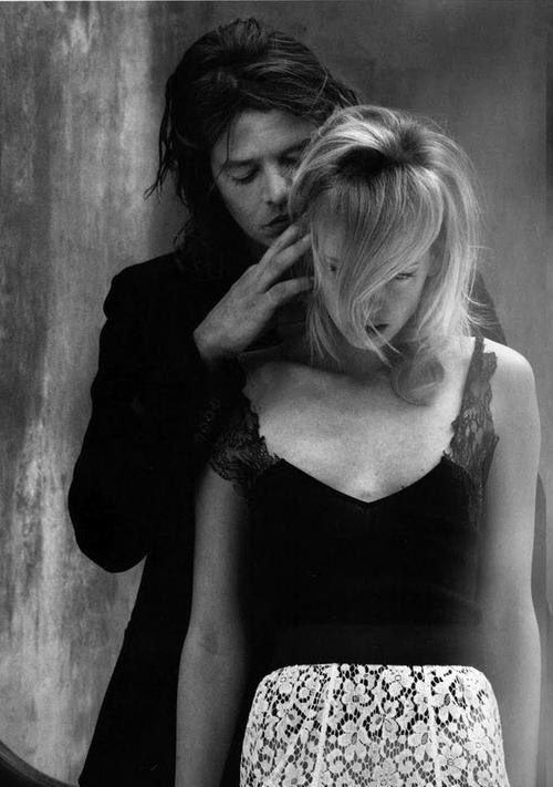 He has so completely absorbed her entire focus,taken command of all of her senses,
