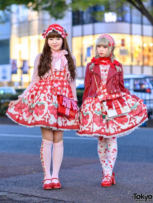 tokyo-fashion: Japanese lolitas Acchan and Reona on the street in Harajuku wearing strawberry and ch