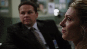 ‘Cause you know, I got handcuffs. Call me when you’re a free man.Ladies of POI Challenge. Prompt - grin.