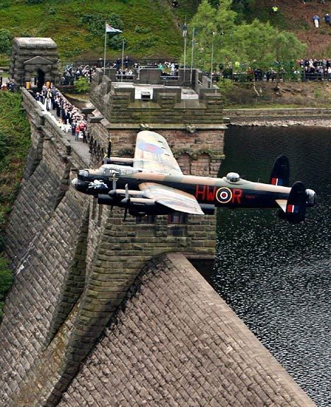 Porn bmachine:  An Avro Lancaster bomber flies photos