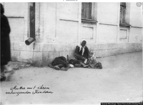 A photo taken by Austrian chemical engineer Alexander Wienerberger during Holodomor (Famine genocide) in the city of Kharkiv, Ukraine, in the spring or summer of 1933. His handwritten caption on the picture states: “Mother with her starving children”...