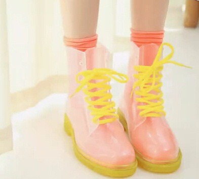 transparent boots with colorful detail. comes in pink, yellow, orange, blue and green! buy them here