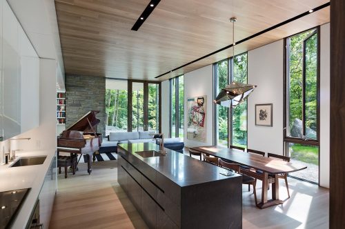 thekhooll:Pound Ridge HouseKieranTimberlakeThe site for this home is a south-facing, boulder-strewn escarpment that rises over a hundred feet, from a wetland to the top of a ridge. The owners were drawn to the almost magical sense of tranquility they
