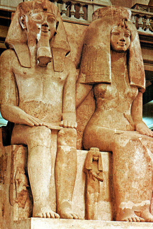 Colossal Statue of Amenhotep III and Queen TiyeThis colossal statue of Amenhotep III and Tiye is a g