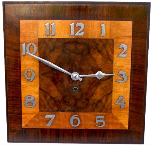 retropopcult:  Art deco walnut wall clock, circa 1930