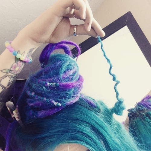 tessarr:  Unbraiding the dreadlocks for the bleaching and dyeing process! 😜