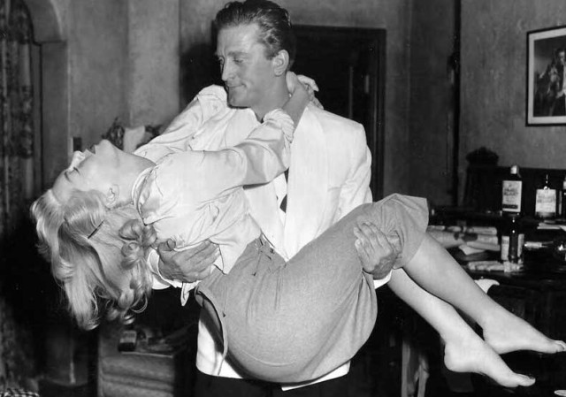 Lana Turner and Kirk Douglas