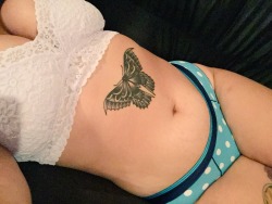 You have a beautiful butterfly above a beautiful belly button!! 