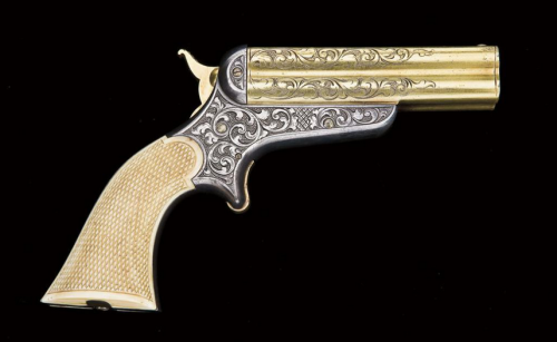 Engraved Sharps Hanking Model 3a four barrel derringer with checkered ivory grips.  Mid 19th century