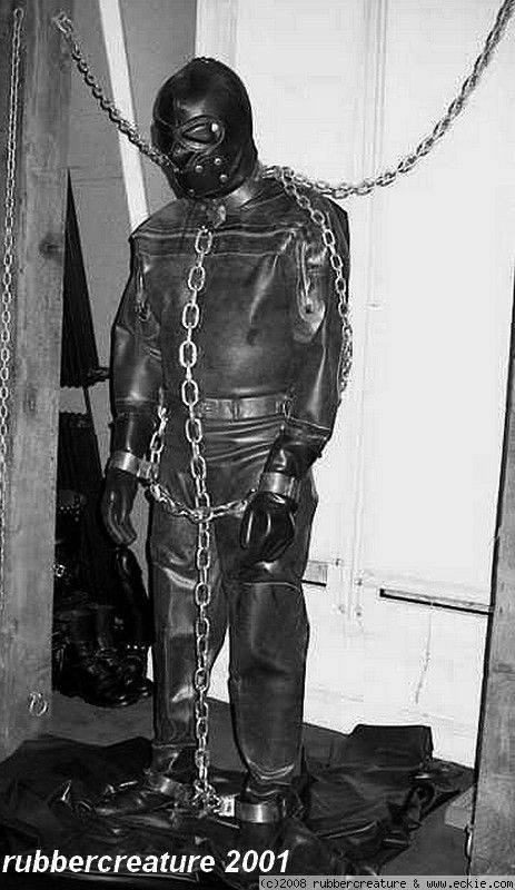 northernleather:  Great way to store a gimp, I wish it was me chained up in that