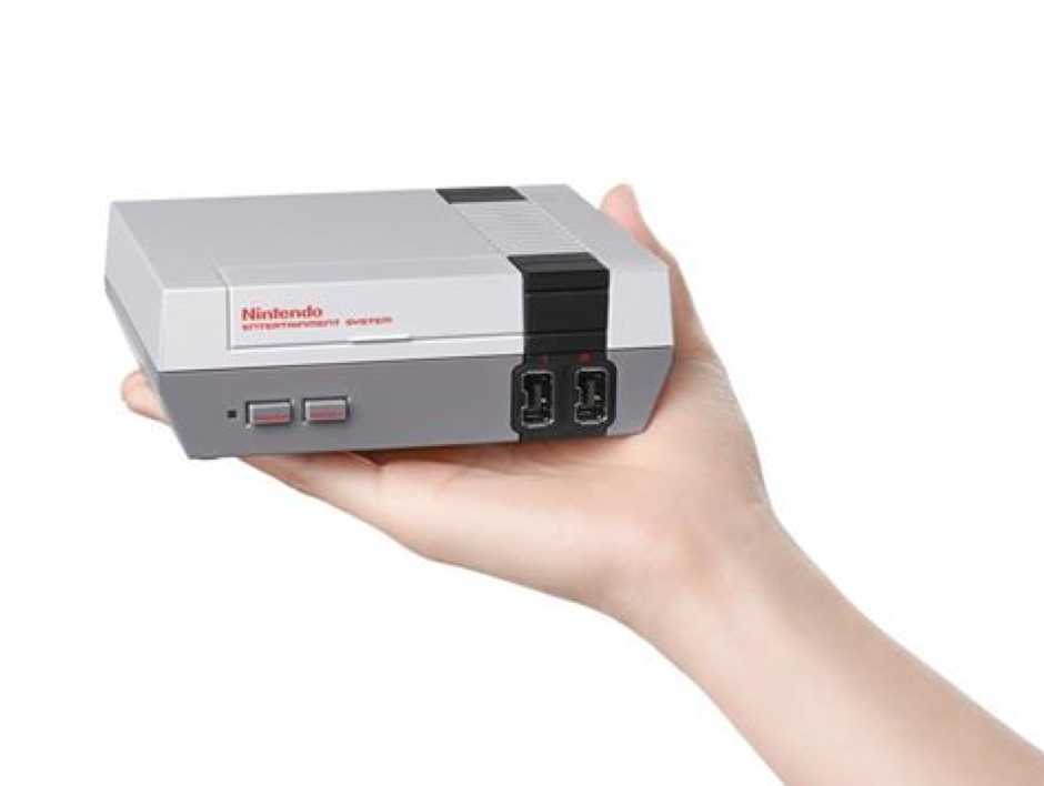 nintendocafe:  Nope, this is not a retro image. The NES is coming back to stores!