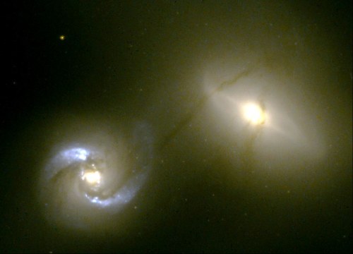 ‘Pipeline’ Funnels Matter Between Colliding Galaxies NGC 1410 and NGC 1409 by NASA Hubbl