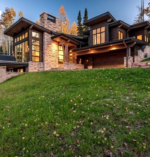 Salt Lake City Exterior SidingExample Of A Large Trendy Beige Two-story Mixed Siding Flat Roof Design