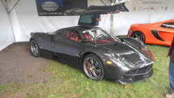 carsandetc:  Welp. just because I can, here’s a few more shots of the bare-carbon Pagani Huayra that showed up at the 2014 Greenwich Concours