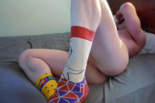 colorslashform:Yeah, I’m definitely a fan of these socks. In retrospect I should have rotated the near one to show the caveman riding a dinosaur in front of a volcano
