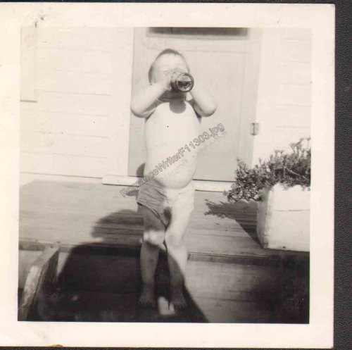 F11303 Hitting the Hard Stuff Vintage Photo of a Cute Little Boy in His Underwear Drinking from a Gl