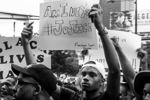 candidinatlanta:  “As the protesters marched through the streets, it began to storm. Every time the thunder crashed, the protesters would cheer louder and louder. It seemed as if mother nature herself were cheering them on..” 