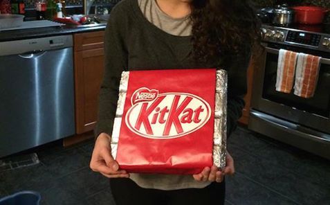 a dudes gf loves kit kat bars so much he made a giant kit kat bar for her bday. 