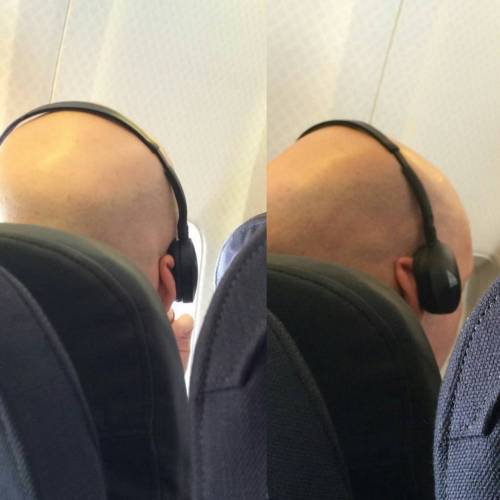 morefunthanb4: This guy had his headphones on like this for almost the entire flight back from Queen