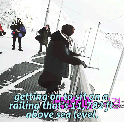  worried staff telling taemin to get off the railing   