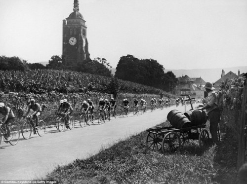 classicvintagecycling: Tour de France, 1937, passing the Arbois Vineyard in Franche-Comte.1937 was t