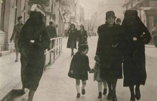 sixpenceee: A Muslim woman uses her veil to cover the yellow star of her Jewish neighbor to protect 