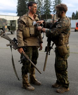 militaryarmament:  Recon Marines with Company C, 1st Reconnaissance Battalion, during a simulated casualty evacuation aboard Joint Base Lewis McChord, Wash, April 10, 2015. 