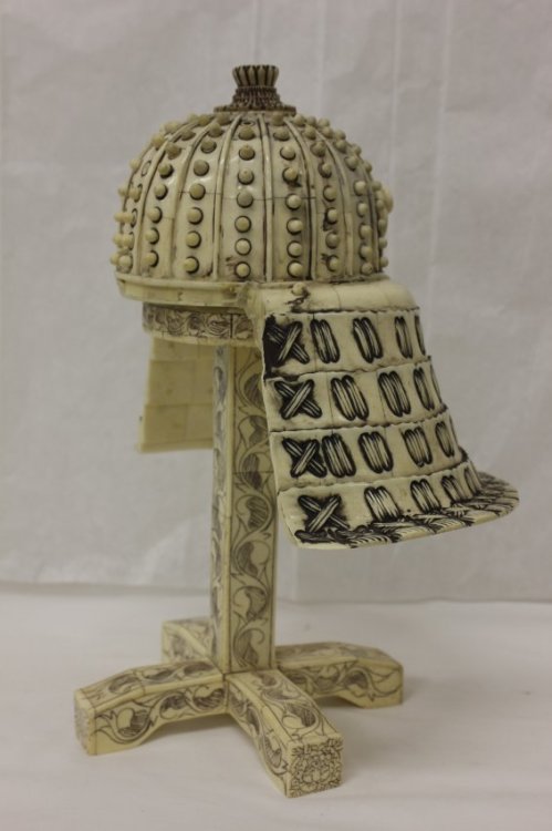 Bone carved samurai hat with stand