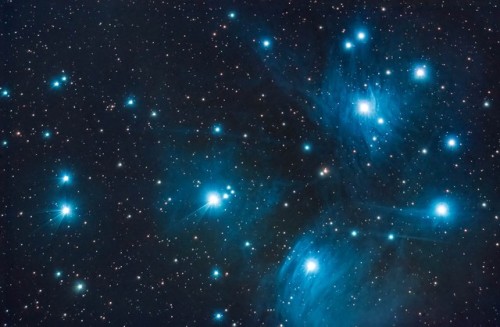 Pleiades, or the Seven Sisters (also known as Messier 45), is an open star cluster located in the co