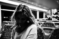 Theresa Manchester on a train, portrait by Lee Nutter