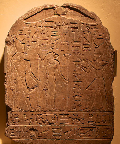 An Egyptian stela from the reign of Psamtik II, who reigned from 595– 589 BC.The king is standing be