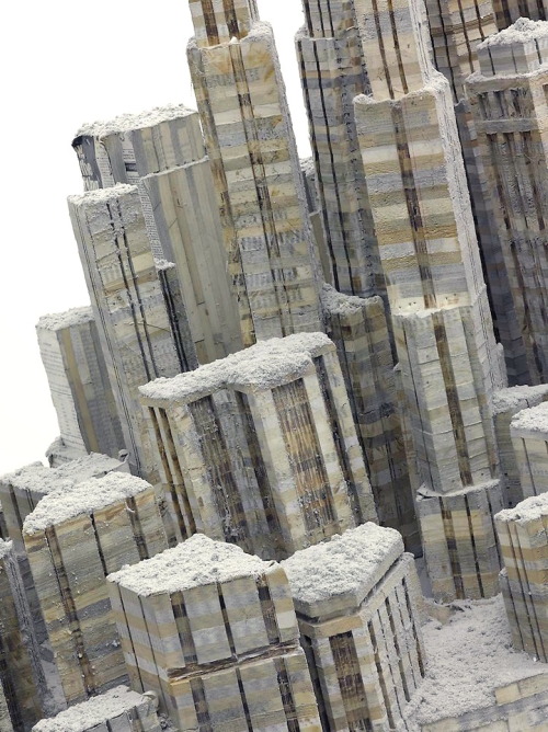 wordsnquotes:  culturenlifestyle:Abandoned Cityscape Book Sculpture by Liu WeiBeijing-based artist Liu Wei carved a stunningly rugged abandoned cityscape from a massive stack of paperback books. He reshaped his materials into one body. New York City-based