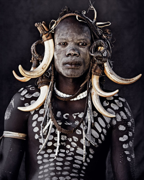 house-of-gnar:  Mursi tribe|Great Rift Valley “The nomadic Mursi tribe lives in the lower area of Africa’s Great Rift Valley. Extreme drought has made it difficult to feed themselves by means of traditional cultivation and herding. The establishment