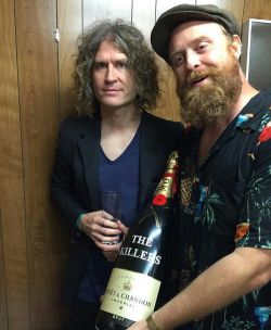 flowers-killers: Repost from @ryanpardey  -  I was so proud to present Dave Keuning with this special bottle of champagne after the Governor’s Ball here in New York City, but judging by his facial expression, he really didn’t give a shit. 