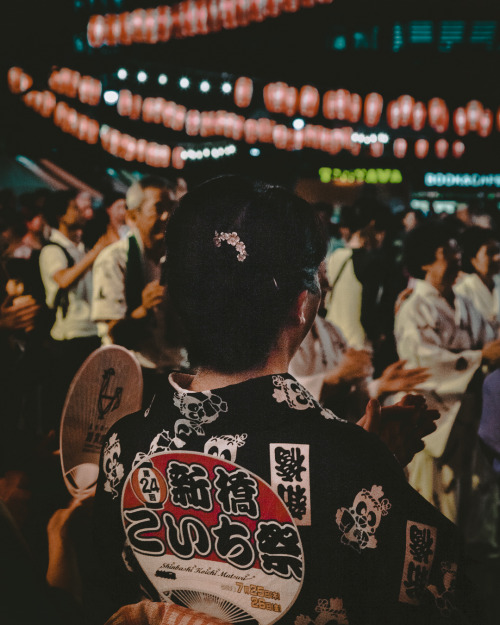 People dancing to the Bon-Dance Music and having fun in Koichi Matsuri Festival at Shinbashi this su