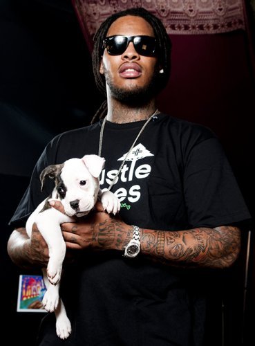 rocknrollercoaster:  Rappers with puppies. 