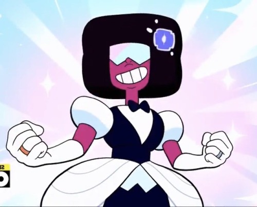 GARNET IS WEARING A WEDDING DRESS MIXED WITH A TUXEDO