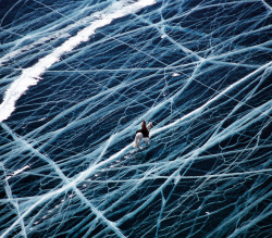 vivahatept1:  fabforgottennobility:  Ice Rider Crosses World’s Oldest Lake French photographer Matthieu Paley is the person behind this almost unbelievable photo called Ice Rider. It was taken in Siberia. &ldquo;A bird’s eye view of Lake Baikal, the