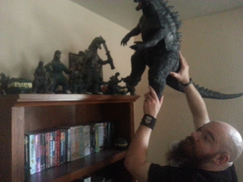betweenfailures:  godzilla3092:  I’m struggling with a place to put this thing.  The heartwarming saga of a man and the plastic lizard he loves. 